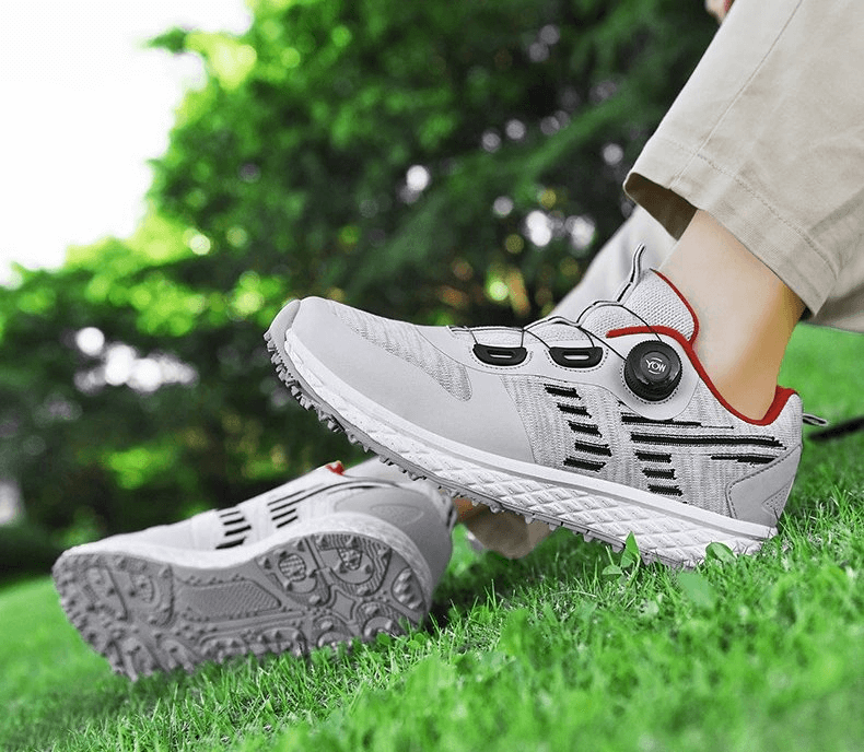 Person wearing breathable flexible casual lace-up sneakers SF0721, relaxing on grass. Ideal unisex daily wear with comfort mesh and rubber sole.